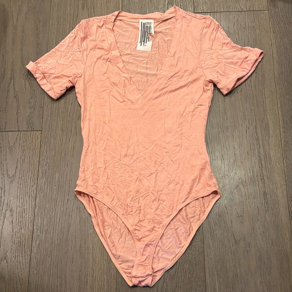 FREE PEOPLE | NWOT Deep V Neck Tee in Pink - Picture 1 of 3
